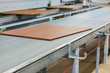 wooden boards on conveyer at furniture factory