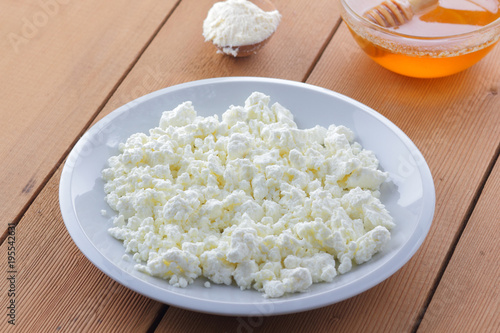 Cheese Fresh Cottage Cheese In A White Plate Wooden Spoon