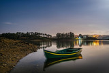 Fototapeta Pomosty - Boat by the river Zezere