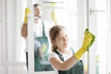 People cleaning windows