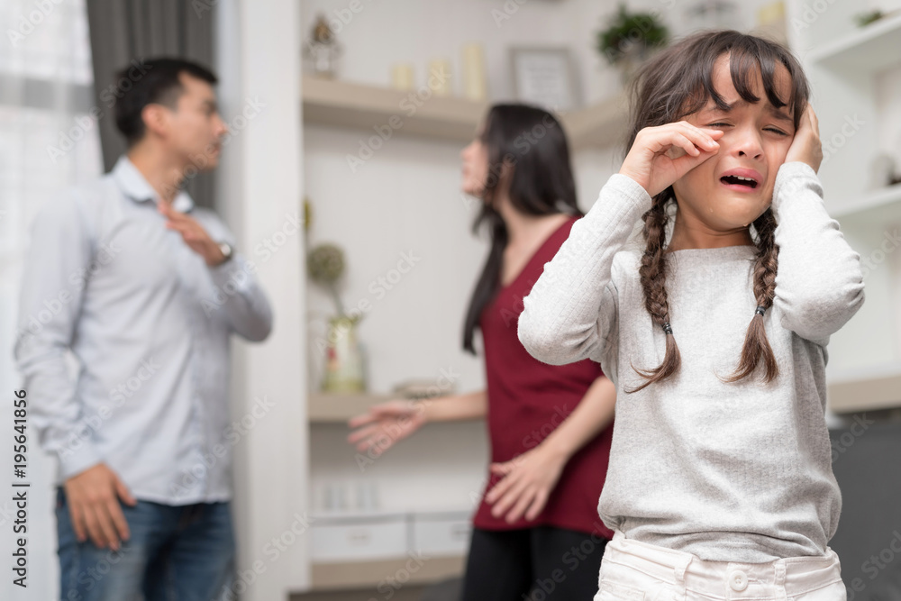 Domestic violence and Family conflict concept. Sadness little girl ...