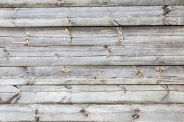 The texture of the old wooden fence boards