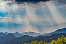 Clouds Above Sun Rays Shining On The Blue Ridge Mountains