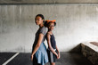 © LeaJones/Stocksy - black sisters posing back to back