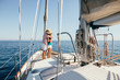 © BONNINSTUDIO/Stocksy - Family enjoying a summer day on a sailboat.