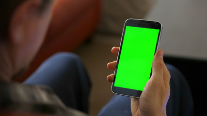 Man Using Smart Phone with Chroma Green Screen