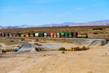 Union Pacific Railroad Locomotive Carrying Long Freight Cars