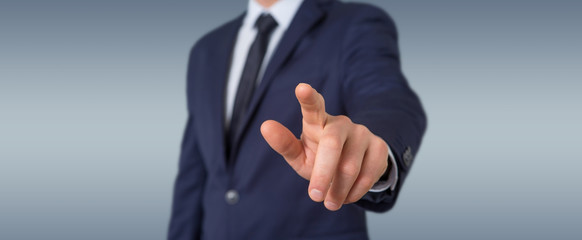 Businessman pointing finger