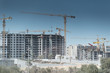 Lots of tower Construction site with cranes and building with blue sky background
