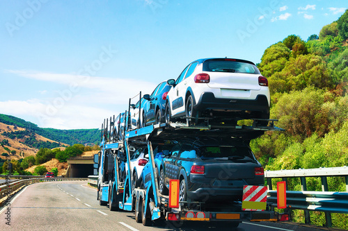 Cuadros en Lienzo Car transporter on road in Nuoro Sardinia