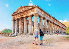 Young Couple At Doric Temple In Segesta In Sicily