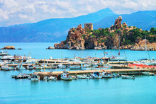 Cefalu Port And Old Castle Ruins In Mediterranean Sea Sicily