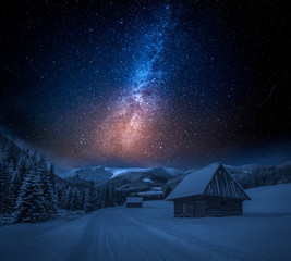 Wall Mural - Milky way and snowy footpath at night in Tatra Mountains