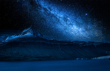 Wall Mural - milky way and volcanic mountain over fjord at night, iceland