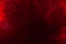 Red Smoke Or Flame Texture On A Black Background. Texture And Abstract Art