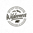 vintage wilderness logo. hand drawn retro styled outdoor adventure emblem. vector illustration