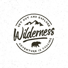 Vintage Wilderness Logo. Hand Drawn Retro Styled Outdoor Adventure Emblem. Vector Illustration