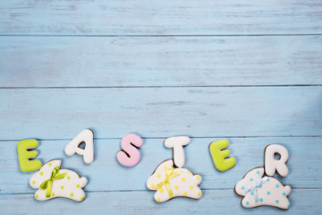 Sticker - Sweets for celebrate Easter. Gingerbread in shape of easter bunny and letter Easter.