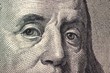 Dollars closeup. Benjamin Franklin's portrait on one hundred dollar bill