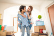 © oneinchpunch - Couple moving into new house