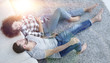 © ASDF - smiling couple lying on a carpet in a new apartment