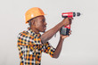 © Rychko Yevhen - African American worker uses electric screwdriver
