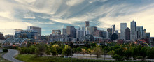 Denver Skyline With Morning Colors And Clouds Over The City