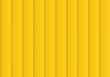 Colorful background consisting of yellow rectangle in a row next to each other. Mosaic of geometric elements. Yellow vertical louver of parts 
