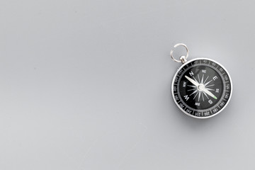 Wall Mural - Compass on gray background top view copy space