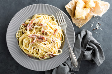 Sticker - Carbonara pasta, spaghetti with pancetta, egg, hard parmesan cheese and cream sauce. Traditional italian cuisine. Pasta alla carbonara