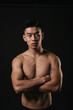 © santypan - Portrait of young asian boy with fitness body.