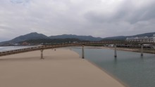 Aerial Drone Shot At Fulong Beach, Taiwan With Zongtong Bridge