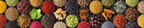 Colored spice background, top view. Collection Indian seasoning in cups