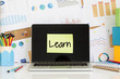  LEARN sticky note pasted on the laptop screen