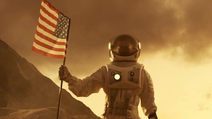 Wall Mural - astronaut walks on mars with a flag of unites states of america, proudly plants it on the surface of