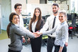 © Bojan - Business team showing unity with their hands together