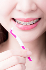 Sticker - woman take interdental brush