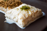 Fototapeta Tulipany - Turkish Milk Dessert Sutlava made with Gullac and Dairy Baklava Dough