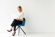 © Drobot Dean - Portrait of a smiling young businesswoman