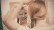 © Voyagerix - Woman with grey clay mud mask on her face