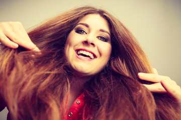 Wall Mural - Happy positive woman with long brown hair