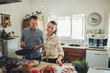 © VAKSMANV - Let's cooking love. Romantic breakfast. Young couple at the kitc