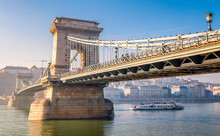 Beautiful View Of The Chain Bridge Over The Danube With Boat In Budapest, Hungary