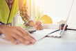 © Aunging - Construction engineer working Planning for a New Project on table in meeting room