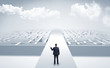 © ra2 studio - Businessman going straight on two mazes