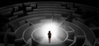 © ra2 studio - Woman choosing between entrances in a middle of a dark maze