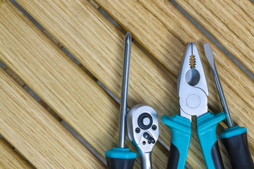 set of tools on a wooden background.