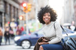 © Mat Hayward - Black girl laughing with pretty smile outside in city