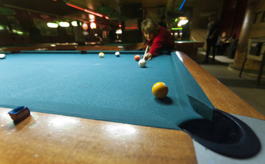  Female player during the billiard game.