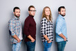 © deagreez - Leadership ethnicity community leisure lifestyle model concept. Half-turned side profile view photo of serious self-assured four guys, checkered denim stylish trendy shirt isolated on gray background